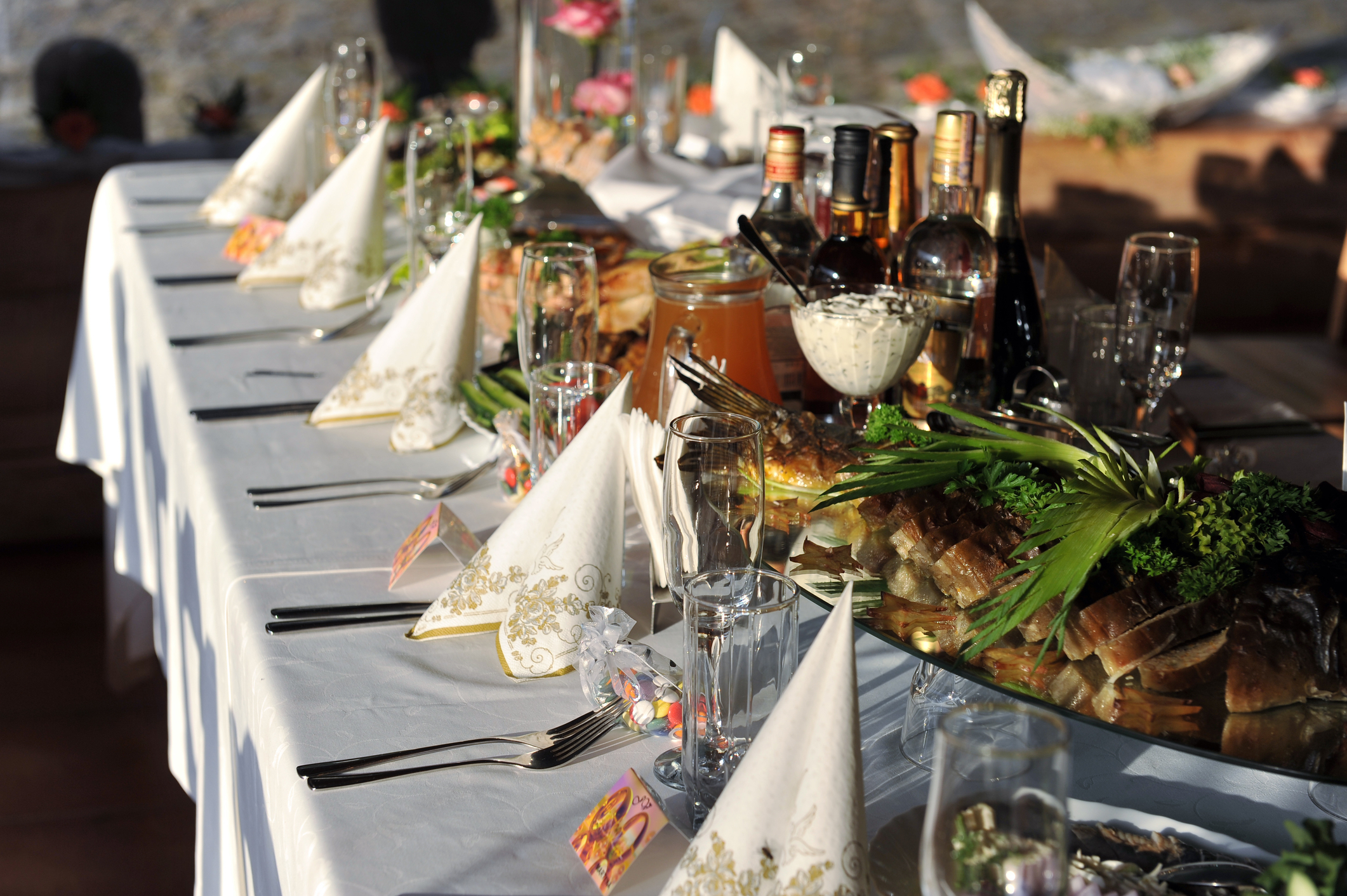 Gala reception, places ready for guests. table with food and drink. Non-profit Event Planning - Cultivate Event Planning