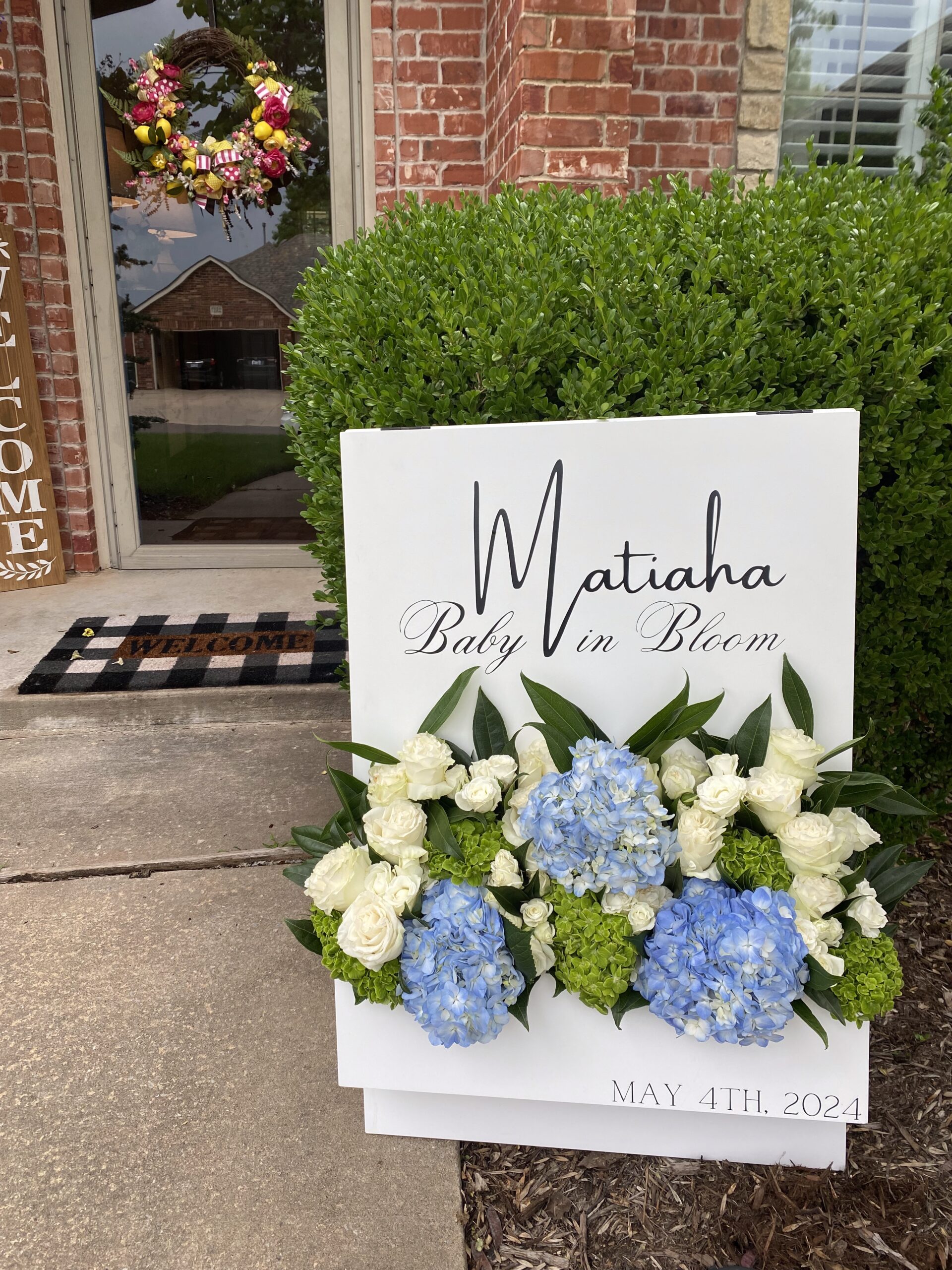 Baby shower welcome sign at private event planned by Cultivate Event Planning.