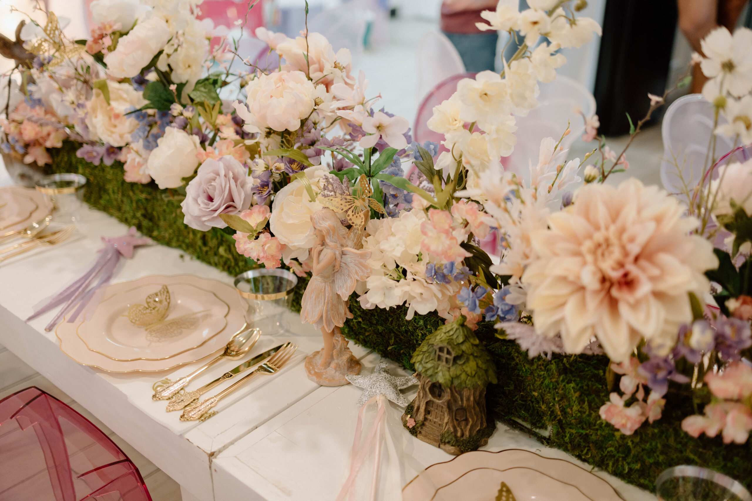 Private event table set with beautiful flowers. Private Event Planning OKC - Cultivate Event Planning